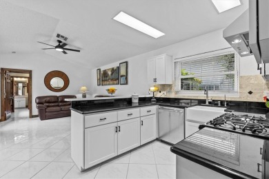 Welcome to your private oasis in the heart of Tarpon Springs! on Tarpon Springs Golf Course in Florida - for sale on GolfHomes.com, golf home, golf lot