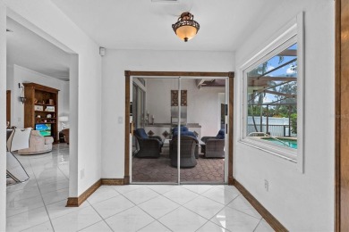 Welcome to your private oasis in the heart of Tarpon Springs! on Tarpon Springs Golf Course in Florida - for sale on GolfHomes.com, golf home, golf lot
