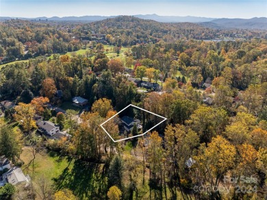 Untouched by recent storms, and move-in ready; this beautifully on Country Club of Asheville in North Carolina - for sale on GolfHomes.com, golf home, golf lot