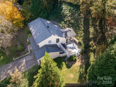 Untouched by recent storms, and move-in ready; this beautifully on Country Club of Asheville in North Carolina - for sale on GolfHomes.com, golf home, golf lot