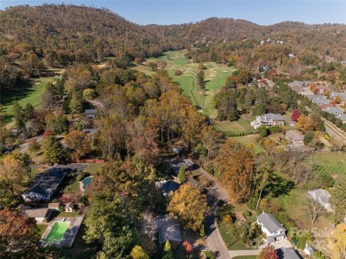 Untouched by recent storms, and move-in ready; this beautifully on Country Club of Asheville in North Carolina - for sale on GolfHomes.com, golf home, golf lot