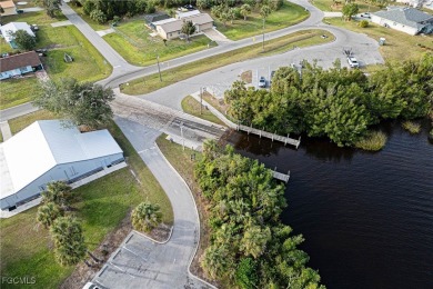 NO HURRICANE OR WATER DAMAGE! PRIVATE BOAT DOCK WITH LIFT on Deep Creek Golf Club in Florida - for sale on GolfHomes.com, golf home, golf lot