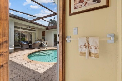Welcome to your private oasis in the heart of Tarpon Springs! on Tarpon Springs Golf Course in Florida - for sale on GolfHomes.com, golf home, golf lot