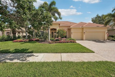 Immaculate Bonaire model with custom free form pool, amazing lot on Pelican Pointe Golf and Country Club in Florida - for sale on GolfHomes.com, golf home, golf lot