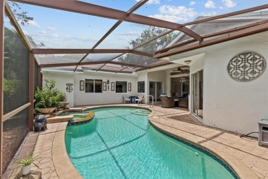 Welcome to your private oasis in the heart of Tarpon Springs! on Tarpon Springs Golf Course in Florida - for sale on GolfHomes.com, golf home, golf lot