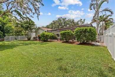 Welcome to your private oasis in the heart of Tarpon Springs! on Tarpon Springs Golf Course in Florida - for sale on GolfHomes.com, golf home, golf lot