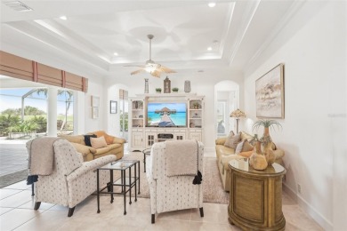 Immaculate Bonaire model with custom free form pool, amazing lot on Pelican Pointe Golf and Country Club in Florida - for sale on GolfHomes.com, golf home, golf lot