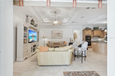 Immaculate Bonaire model with custom free form pool, amazing lot on Pelican Pointe Golf and Country Club in Florida - for sale on GolfHomes.com, golf home, golf lot