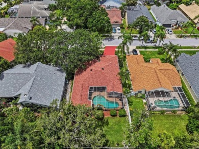 Welcome to your private oasis in the heart of Tarpon Springs! on Tarpon Springs Golf Course in Florida - for sale on GolfHomes.com, golf home, golf lot