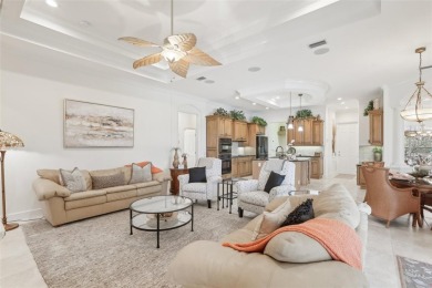 Immaculate Bonaire model with custom free form pool, amazing lot on Pelican Pointe Golf and Country Club in Florida - for sale on GolfHomes.com, golf home, golf lot