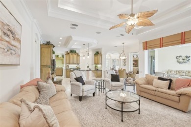 Immaculate Bonaire model with custom free form pool, amazing lot on Pelican Pointe Golf and Country Club in Florida - for sale on GolfHomes.com, golf home, golf lot
