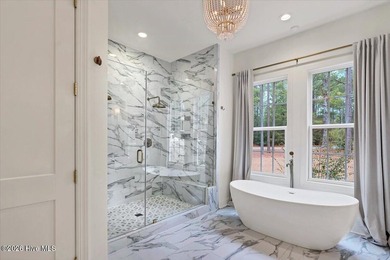 Welcome to 15 Deer Track Road - a stunning custom home completed on Foxfire Golf and Country Club in North Carolina - for sale on GolfHomes.com, golf home, golf lot