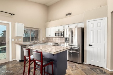 This sweet home in the Oasis at the Foothills golf club on The Foothills Golf Club in Arizona - for sale on GolfHomes.com, golf home, golf lot