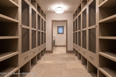 Set on a 2.43-acre Estate lot in 3 Creek Ranch, Mirror Pond on 3 Creek Ranch Golf Club in Wyoming - for sale on GolfHomes.com, golf home, golf lot