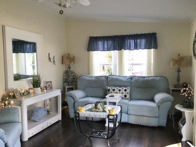 Meticulously maintained  home situated at the end of a quiet on Spanish Lakes I in Florida - for sale on GolfHomes.com, golf home, golf lot