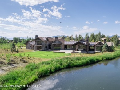 Set on a 2.43-acre Estate lot in 3 Creek Ranch, Mirror Pond on 3 Creek Ranch Golf Club in Wyoming - for sale on GolfHomes.com, golf home, golf lot