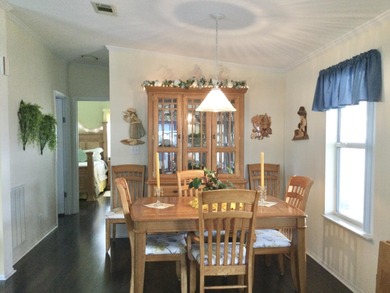 Meticulously maintained  home situated at the end of a quiet on Spanish Lakes I in Florida - for sale on GolfHomes.com, golf home, golf lot