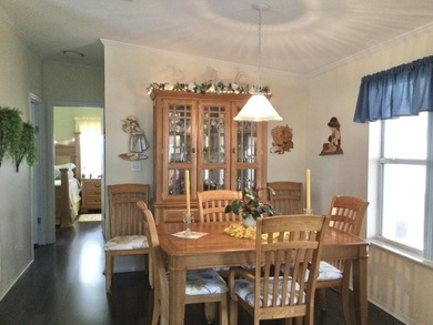 Meticulously maintained home situated at the end of a quiet on Spanish Lakes I in Florida - for sale on GolfHomes.com, golf home, golf lot