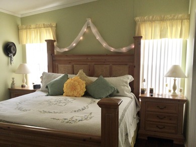 Meticulously maintained  home situated at the end of a quiet on Spanish Lakes I in Florida - for sale on GolfHomes.com, golf home, golf lot