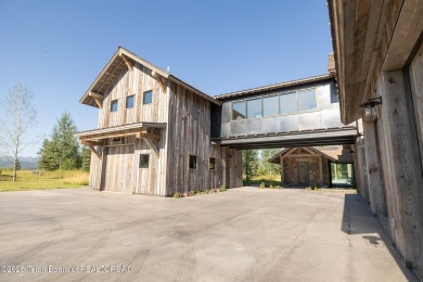 Set on a 2.43-acre Estate lot in 3 Creek Ranch, Mirror Pond on 3 Creek Ranch Golf Club in Wyoming - for sale on GolfHomes.com, golf home, golf lot