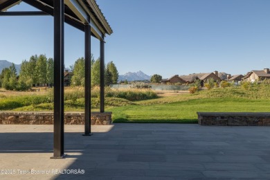 Set on a 2.43-acre Estate lot in 3 Creek Ranch, Mirror Pond on 3 Creek Ranch Golf Club in Wyoming - for sale on GolfHomes.com, golf home, golf lot