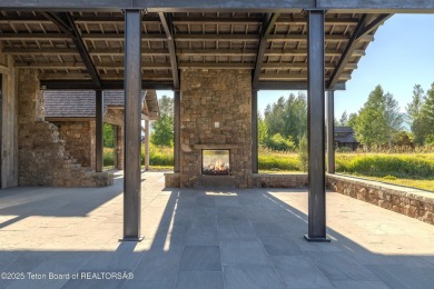 Set on a 2.43-acre Estate lot in 3 Creek Ranch, Mirror Pond on 3 Creek Ranch Golf Club in Wyoming - for sale on GolfHomes.com, golf home, golf lot