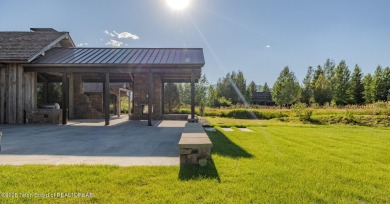 Set on a 2.43-acre Estate lot in 3 Creek Ranch, Mirror Pond on 3 Creek Ranch Golf Club in Wyoming - for sale on GolfHomes.com, golf home, golf lot