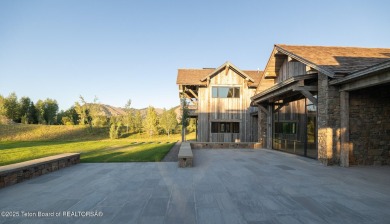 Set on a 2.43-acre Estate lot in 3 Creek Ranch, Mirror Pond on 3 Creek Ranch Golf Club in Wyoming - for sale on GolfHomes.com, golf home, golf lot