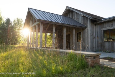 Set on a 2.43-acre Estate lot in 3 Creek Ranch, Mirror Pond on 3 Creek Ranch Golf Club in Wyoming - for sale on GolfHomes.com, golf home, golf lot