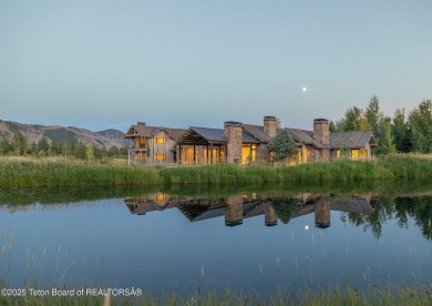 Set on a 2.43-acre Estate lot in 3 Creek Ranch, Mirror Pond on 3 Creek Ranch Golf Club in Wyoming - for sale on GolfHomes.com, golf home, golf lot