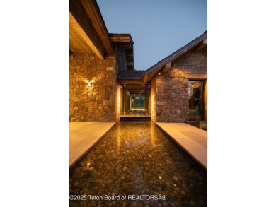 Set on a 2.43-acre Estate lot in 3 Creek Ranch, Mirror Pond on 3 Creek Ranch Golf Club in Wyoming - for sale on GolfHomes.com, golf home, golf lot