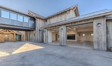 Set on a 2.43-acre Estate lot in 3 Creek Ranch, Mirror Pond on 3 Creek Ranch Golf Club in Wyoming - for sale on GolfHomes.com, golf home, golf lot