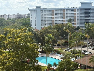 Escape to this spacious 2BR/2BA condo situated in a private on Palm-Aire Country Club and Resort - Palms in Florida - for sale on GolfHomes.com, golf home, golf lot