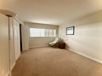 Escape to this spacious 2BR/2BA condo situated in a private on Palm-Aire Country Club and Resort - Palms in Florida - for sale on GolfHomes.com, golf home, golf lot
