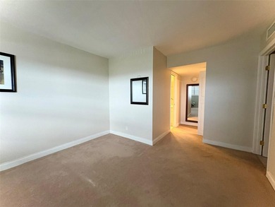 Escape to this spacious 2BR/2BA condo situated in a private on Palm-Aire Country Club and Resort - Palms in Florida - for sale on GolfHomes.com, golf home, golf lot