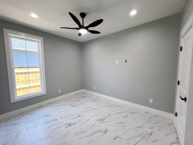 This adorable brand new three-bedroom home is perfect for your on Lamar Golf Course in Texas - for sale on GolfHomes.com, golf home, golf lot