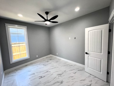 This adorable brand new three-bedroom home is perfect for your on Lamar Golf Course in Texas - for sale on GolfHomes.com, golf home, golf lot