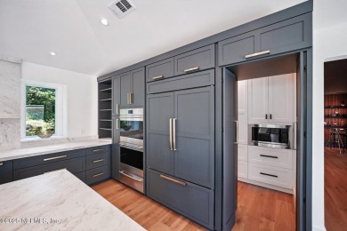 Stunningly renovated corner lot home, nestled under a canopy of on Sawgrass Country Club  in Florida - for sale on GolfHomes.com, golf home, golf lot
