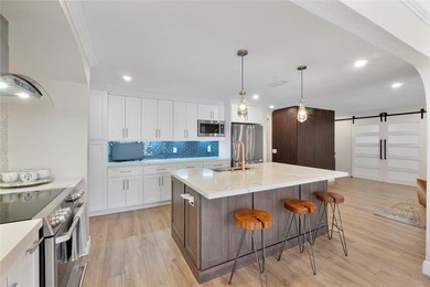 Beautiful, fully renovated modern retreat on the golf course in on Country Club of Coral Springs in Florida - for sale on GolfHomes.com, golf home, golf lot