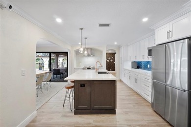 Beautiful, fully renovated modern retreat on the golf course in on Country Club of Coral Springs in Florida - for sale on GolfHomes.com, golf home, golf lot