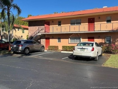 First floor corner unit with convenient parking in front of the on Monterey Yacht and Country Club in Florida - for sale on GolfHomes.com, golf home, golf lot