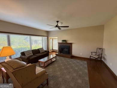 Escape to the mountains in this charming 2-bedroom, 2-bathroom on Sky Valley Resort and Country Club in Georgia - for sale on GolfHomes.com, golf home, golf lot