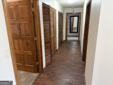 Escape to the mountains in this charming 2-bedroom, 2-bathroom on Sky Valley Resort and Country Club in Georgia - for sale on GolfHomes.com, golf home, golf lot