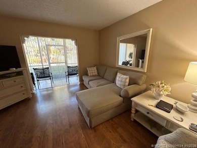 First floor corner unit with convenient parking in front of the on Monterey Yacht and Country Club in Florida - for sale on GolfHomes.com, golf home, golf lot