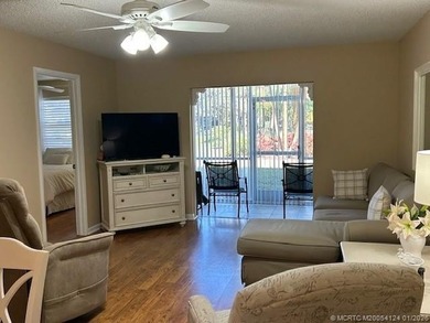 First floor corner unit with convenient parking in front of the on Monterey Yacht and Country Club in Florida - for sale on GolfHomes.com, golf home, golf lot