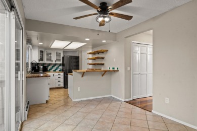 Come see this townhome with personality for days! Located in the on Tiara Rado Golf Course in Colorado - for sale on GolfHomes.com, golf home, golf lot