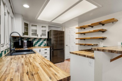 Come see this townhome with personality for days! Located in the on Tiara Rado Golf Course in Colorado - for sale on GolfHomes.com, golf home, golf lot