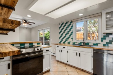 Come see this townhome with personality for days! Located in the on Tiara Rado Golf Course in Colorado - for sale on GolfHomes.com, golf home, golf lot