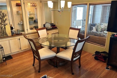 A nice-sized example of well cared for home in the premier on Six Lakes Country Club in Florida - for sale on GolfHomes.com, golf home, golf lot