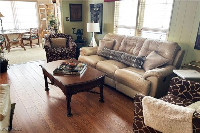 A nice-sized example of well cared for home in the premier on Six Lakes Country Club in Florida - for sale on GolfHomes.com, golf home, golf lot